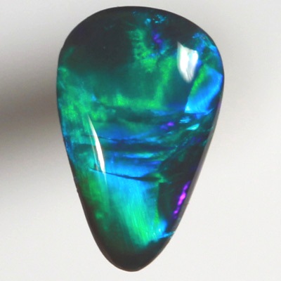 SOLID BLACK OPAL Neon bright green in a Broad Rolling flash